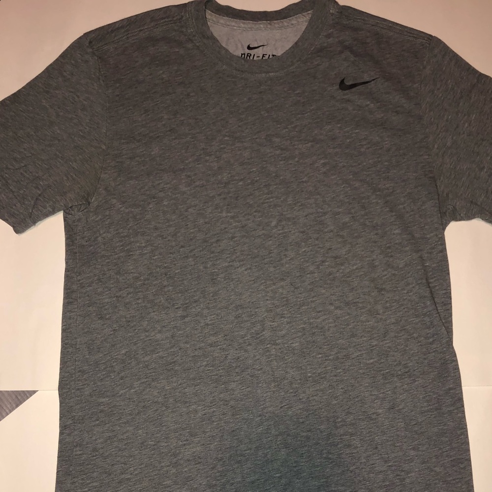 Never worn Nike dri-fit tee shirt!
